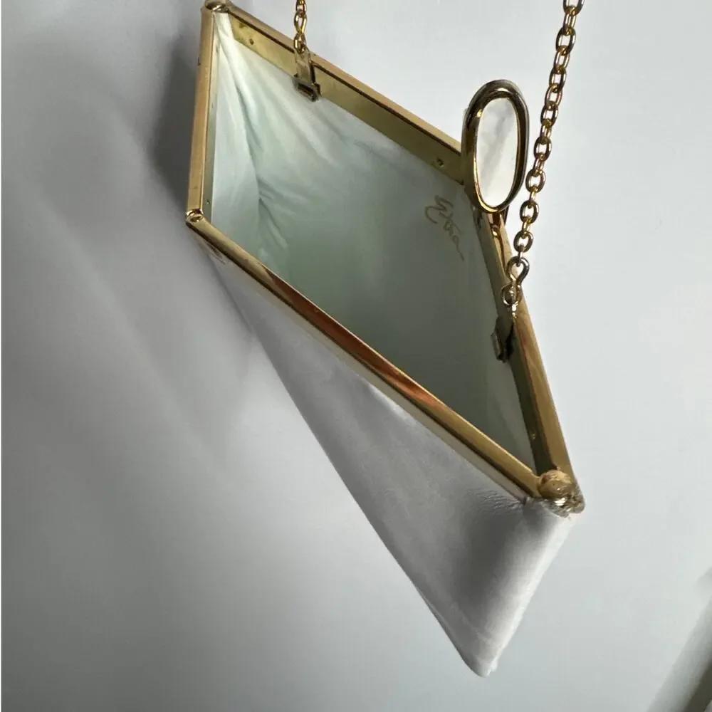 70s Etra white clutch with gold metal frame and matching gold chain strap